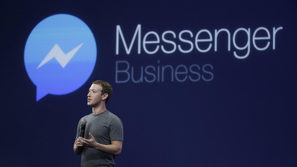 CEO Mark Zuckerberg talks about Messenger app during the Facebook F8 Developer Conference, Wednesday, March 25, 2015, in San Francisco. Facebook is trying to mold its Messenger app into a more versatile communications channel as smartphones create new ways for people to connect with friends and businesses beyond the walls of the company's ubiquitous social network. (AP Photo/Eric Risberg)
