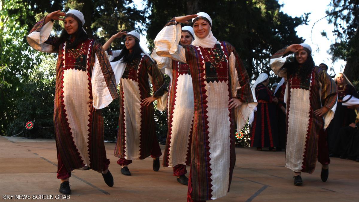 Palestinian women in traditional dresses