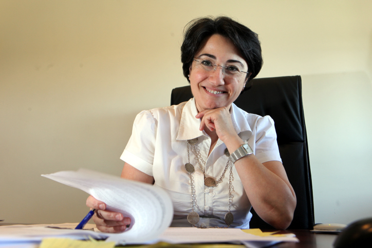 Israeli-Arab lawmaker from the Balad party Hanin Zuabi is reading the Knesset decision on July 18, 2011 at her office in Jerusalem. The Knesset's Ethics Committee voted to strip Zuabi of her right to address the Knesset and to participate in committee votes until the end of this parliamentary season, following her participation in the Gaza-bound flotilla last year. Photo by Yossi Zamir/Flash 90 *** Local Caption *** ???? ????? ???? ???? ????? ???